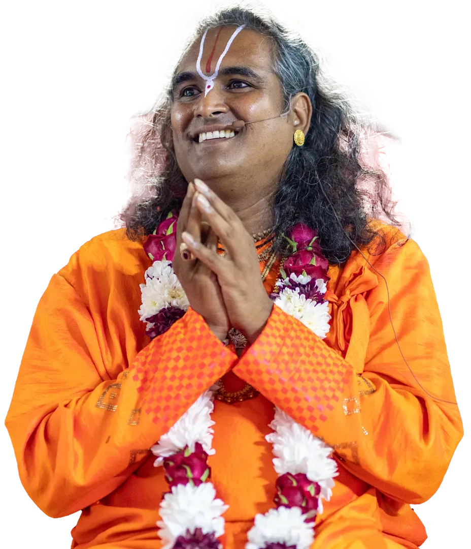 paramahamsa vishwananda smiling and doing prayer hands sign